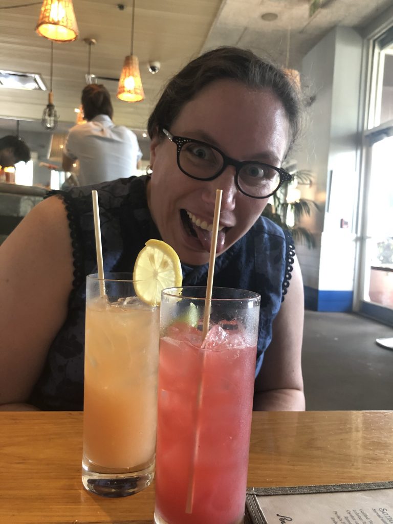 Sonja making a dumb face and cocktails
